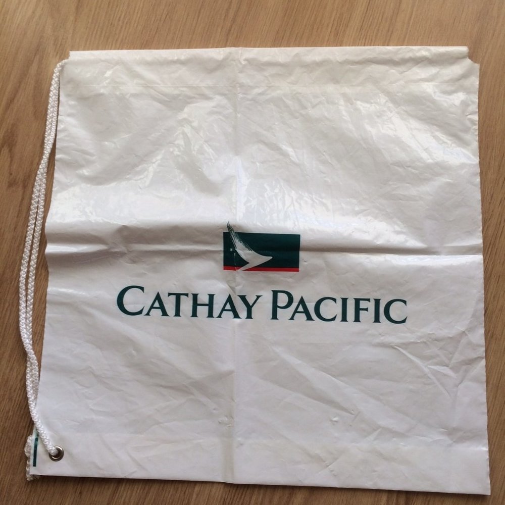 - Cathay Pacific airlines plastic draw nylon code string rug sack carrier bags
